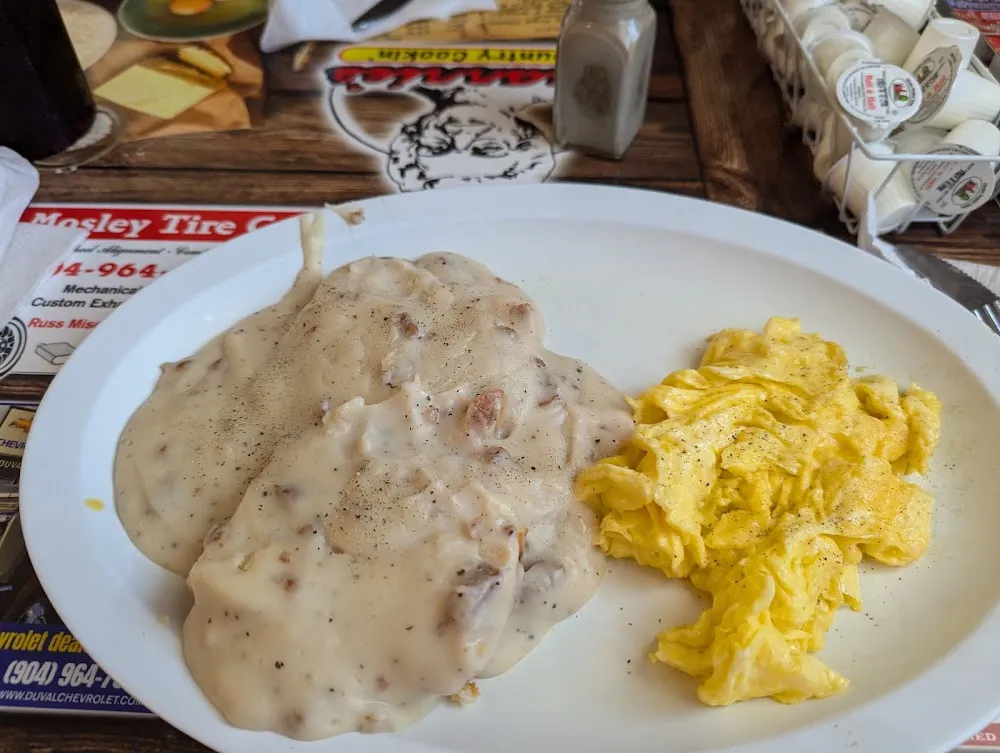 Biscuit and Gravy with Two Eggs Scrambled